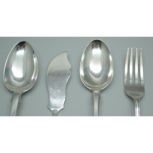 7393 - Two Victorian silver spoons, a silver fork and a silver spreader, 83g