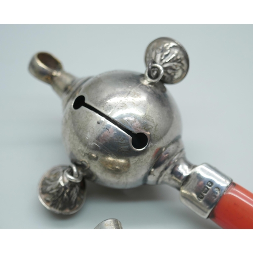 7395 - A silver rattle, Birmingham 1907, a rattle bell and a heart shaped pendant