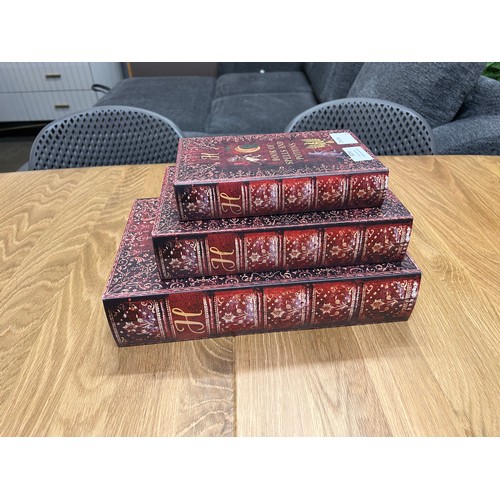 3056 - A set of three Spells and Potions storage books