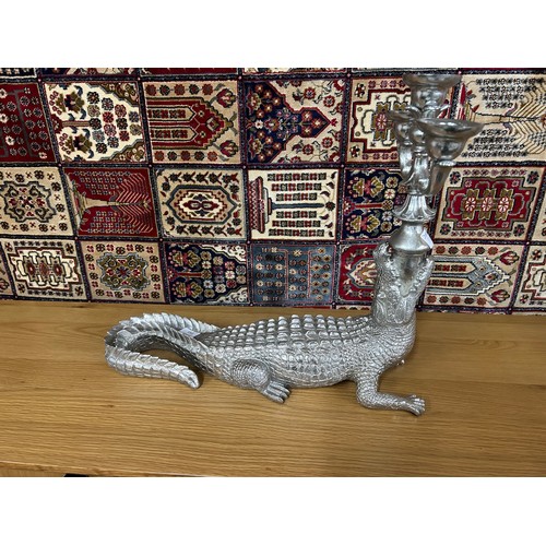 3068 - A silver crocodile candelabra