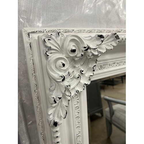 3168 - An antique white large mirror