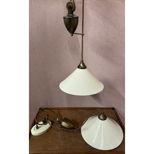 290 - A pair of ceramic height adjustable rise and fall ceiling lights