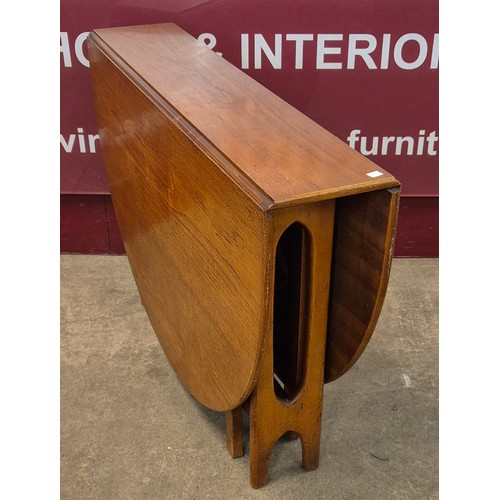 3 - A Jentique teak drop leaf table