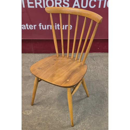 4 - A set of four Ercol Blonde elm and beech 449 model chairs