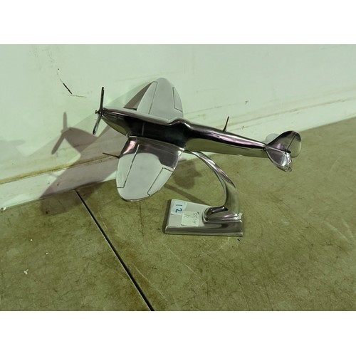 5116 - An aluminium Spitfire model plane * This lot is subject to VAT