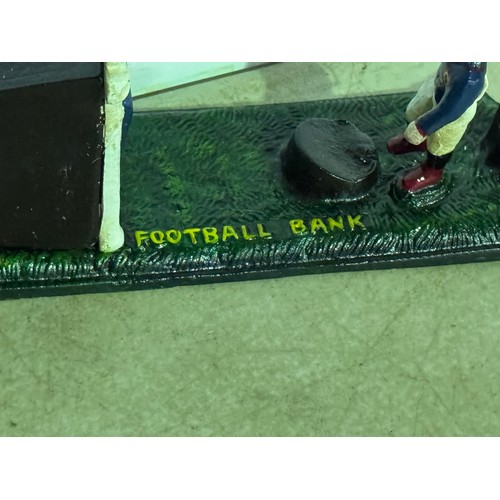 5132 - A cast metal football bank - damaged* This lot is subject to VAT