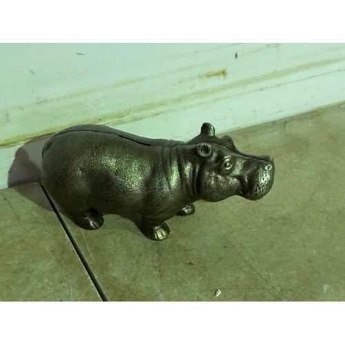 5134 - A cast metal hippo piggy bank* This lot is subject to VAT