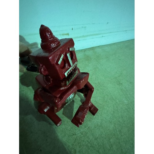 5136 - A cast metal red robot piggy bank* This lot is subject to VAT