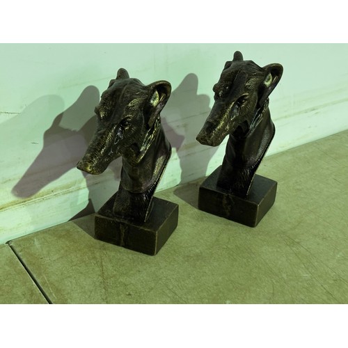 5143 - 2 Cast metal greyhound heads* This lot is subject to VAT