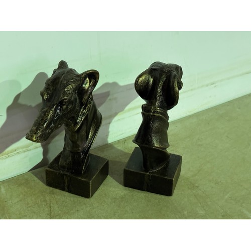 5143 - 2 Cast metal greyhound heads* This lot is subject to VAT