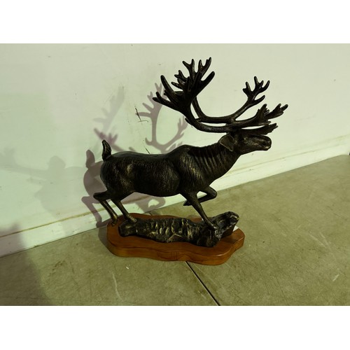 5170 - A cast metal bronze effect statue of a stag with raised leg* This lot is subject to VAT