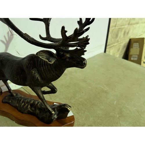 5170 - A cast metal bronze effect statue of a stag with raised leg* This lot is subject to VAT