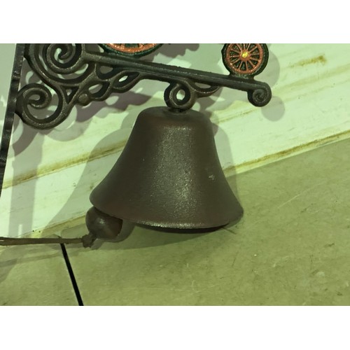 5171 - A cast metal Joseph Brewer & Sons Tractor bell with wall bracket* This lot is subject to VAT