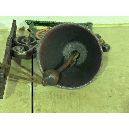 5171 - A cast metal Joseph Brewer & Sons Tractor bell with wall bracket* This lot is subject to VAT