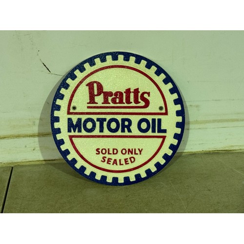 5199 - A circular cast metal Pratts Motor Oil plaque* This lot is subject to VAT