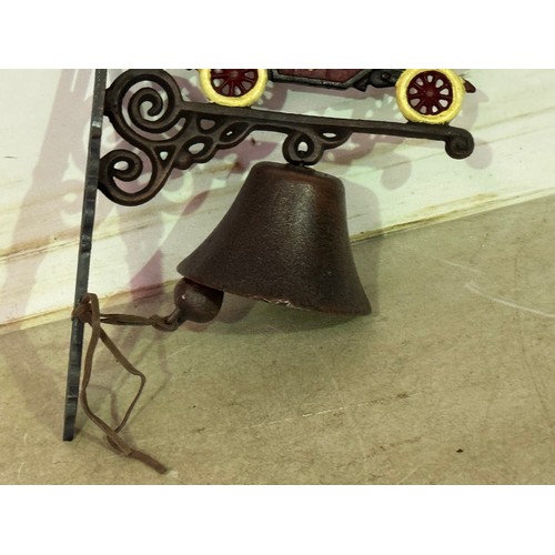 5139 - A cast metal vintage car bell with wall bracket* This lot is subject to VAT