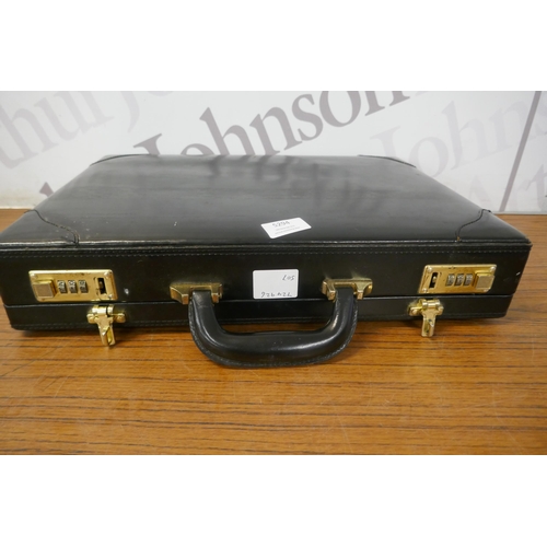 5443 - 2 combination lock briefcases