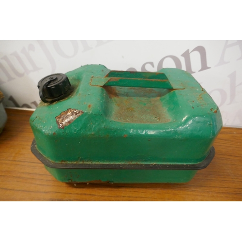 5444 - A green metal Jerry can and 3 assorted metal petrol cans