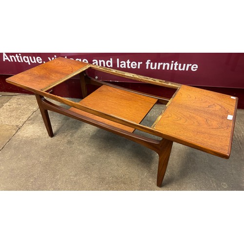 55 - A G-Plan Fresco teak coffee table (lacking glass top)