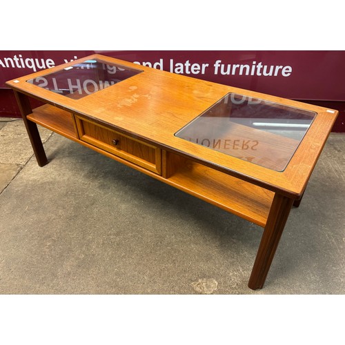 57 - A G-Plan teak and glass topped coffee table