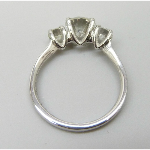 7001 - A hallmarked platinum three stone diamond ring, total diamond weight 1.40cts, centre stone 0.98ct, 3... 