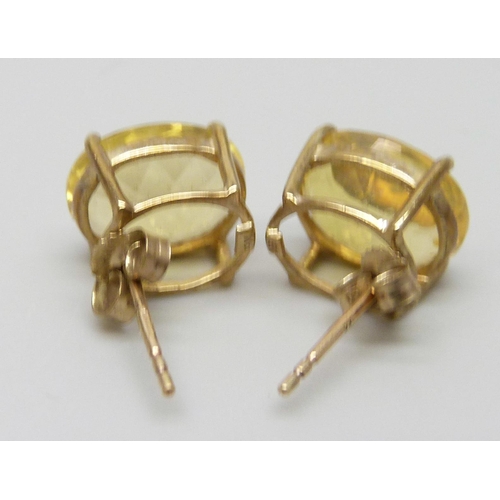 7019 - A pair of 9ct gold and citrine earrings, 2.4g