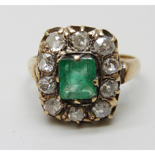 7023 - A Georgian emerald and diamond set ring, 4.8g, L