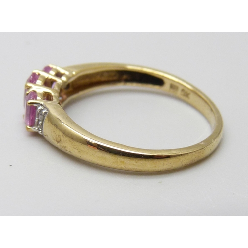 7026 - A 9ct gold pink sapphire and diamond ring, 2.4g, R