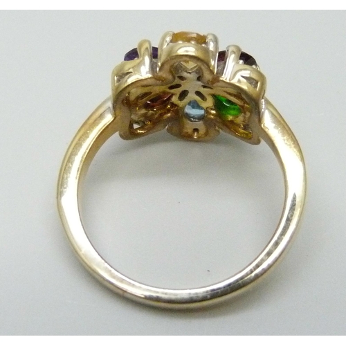 7035 - A silver gilt multi-gem cluster ring, R/S