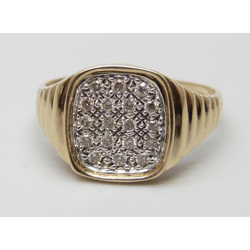 7036 - A 9ct gold pave set diamond ring, 4.2g, U