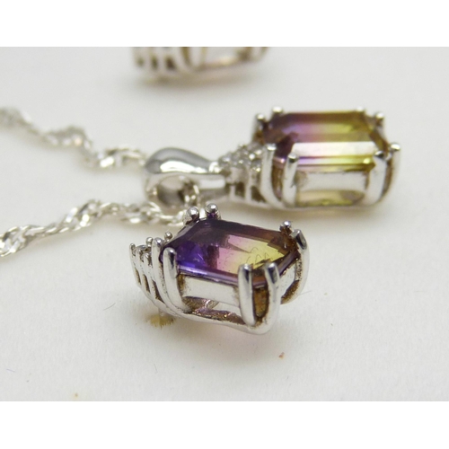 7043 - A silver and mystic topaz pendant and matching earrings