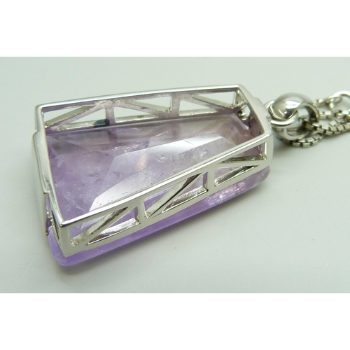 7047 - A large heavy silver set amethyst pendant on a silver chain, pendant 41mm