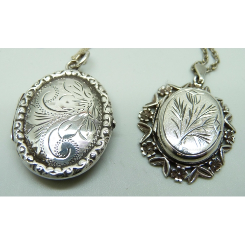 7054 - Two hallmarked silver lockets and chains