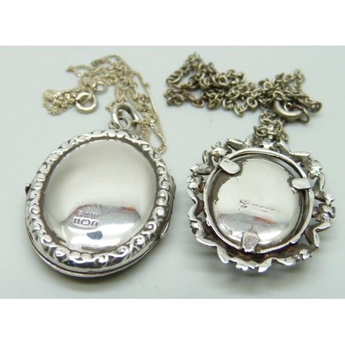 7054 - Two hallmarked silver lockets and chains