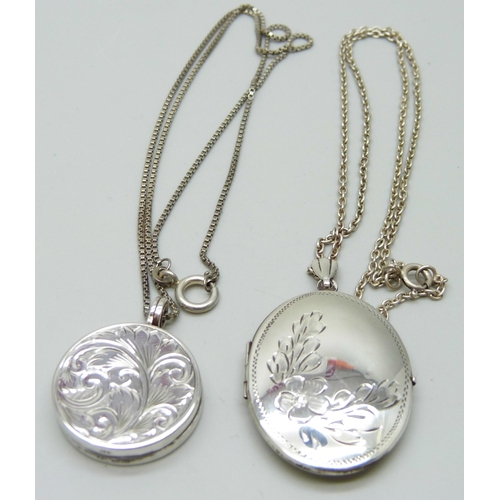 7057 - Two silver lockets and chains