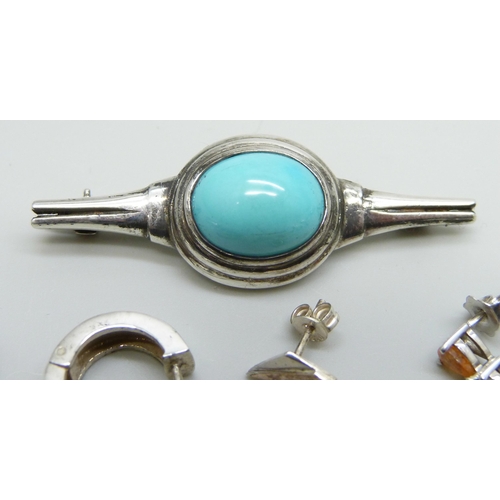 7059 - A silver and turquoise brooch, a hallmarked silver brutalist ring, maker IO, size O, one other silve... 