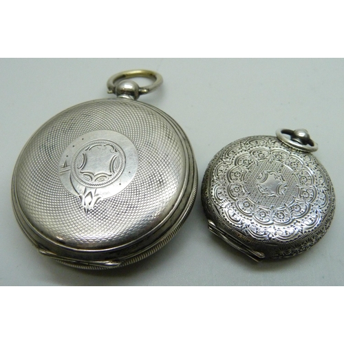 7085 - A silver pocket watch and a silver fob watch