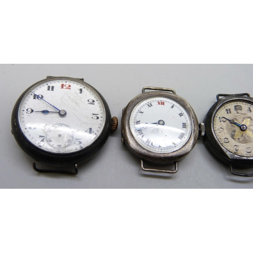 7091 - Four silver cased wristwatches, one Bernex, all with silver import marks, largest 33mm