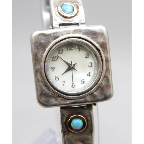 7098 - A designer brutalist silver and synthetic opal wristwatch, signed