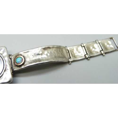 7098 - A designer brutalist silver and synthetic opal wristwatch, signed