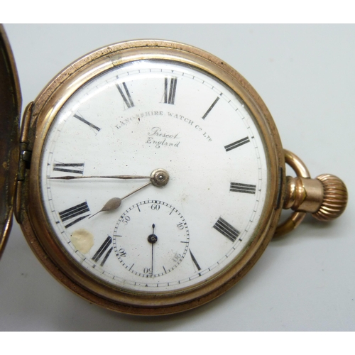 7118 - A silver pocket watch and a rolled gold pocket watch