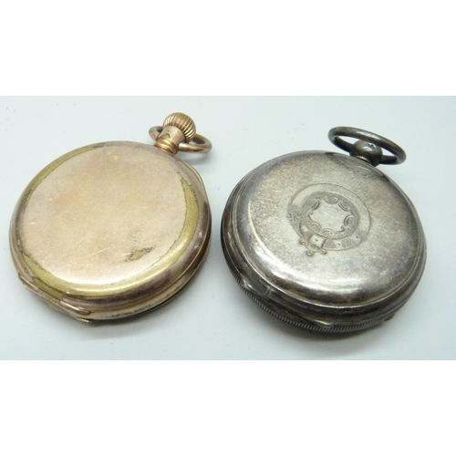 7118 - A silver pocket watch and a rolled gold pocket watch