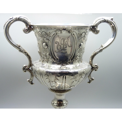 7131 - A Victorian silver two handled cup, Birmingham 1876, George Unite, with inscription dated 1876, 545g... 