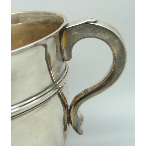 7135 - A silver two handled cup, London 1910, C.S. Harris & Sons Ltd., 346g, diameter 10.5cm