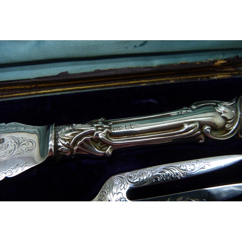 7143 - A pair of Victorian fish servers, cased, John Gilbert, Birmingham 1851, silver covered handles, A1 e... 