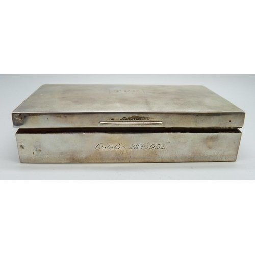 7145 - A silver cigarette box and two silver cigarette cases, (cases 174g, box 380g with liner)