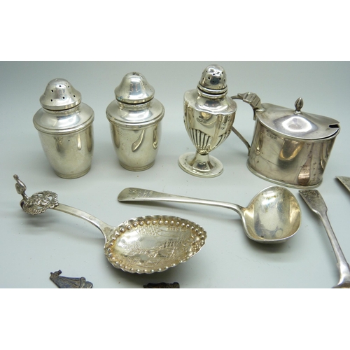 7148 - Five silver condiments and seven silver spoons, 338g