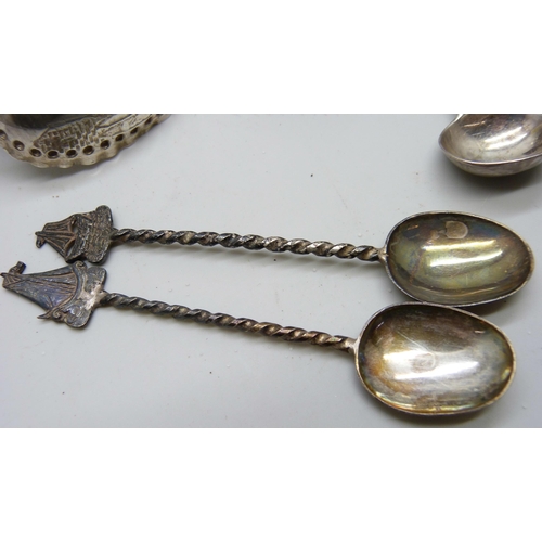 7148 - Five silver condiments and seven silver spoons, 338g