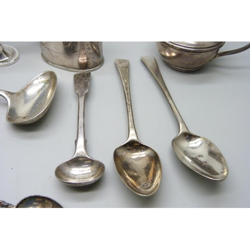 7148 - Five silver condiments and seven silver spoons, 338g