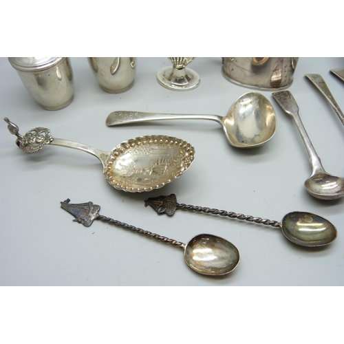 7148 - Five silver condiments and seven silver spoons, 338g